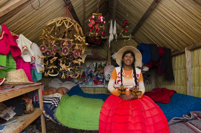 Local residents of floating reed islands of Uros, Lake Titicaca, Peru