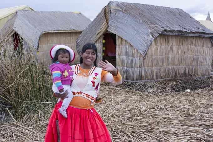 Local residents of floating reed islands of Uros, Lake Titicaca, Peru