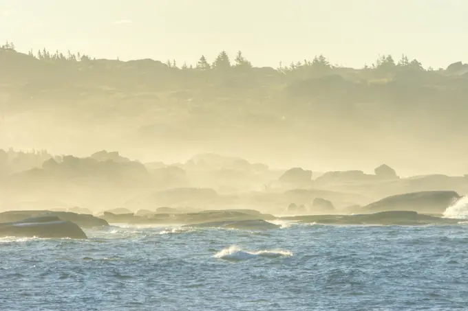 Fog at sunrise along the Atlantic Ocean Peggy's Cove Nova Scotia Canada