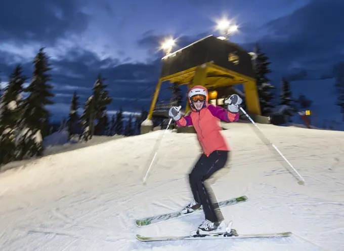 Skiers and snowboarders enjoy the experience and extended hours that night skiing provides at Mt. washington ski resort. Mt. Washington, The Comox Val...