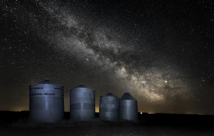 Milkyway over grain bins in rural Manitoba Canada