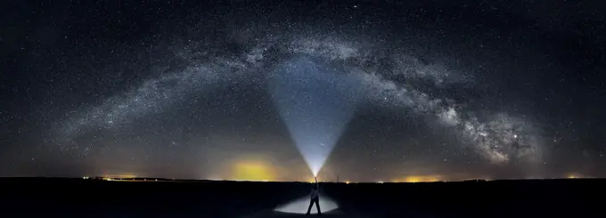 Self portrait on road with full milkyway including core in rural Manitoba Canada