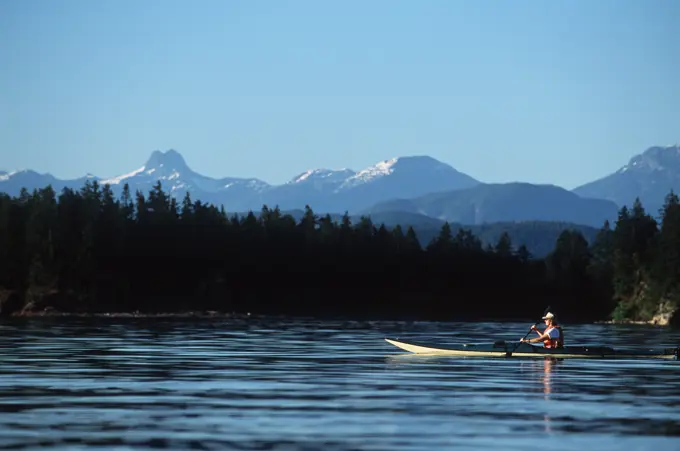 sea kayaker at Breton Islands, near Quadra Island, British Columbia, Canada