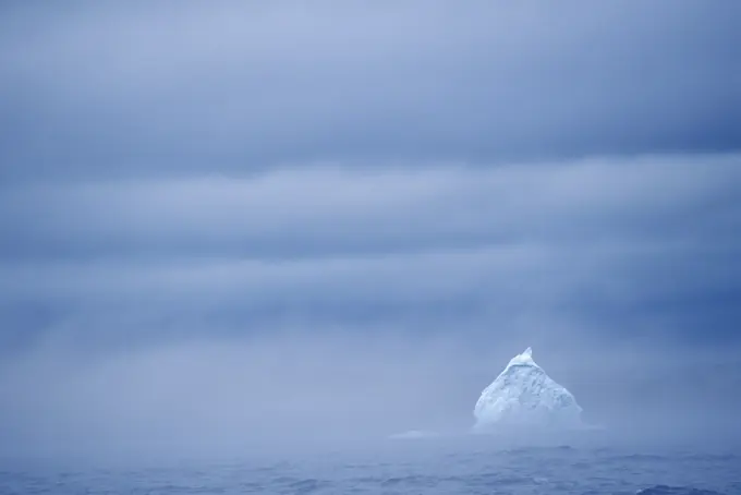 Iceberg in fog Trinity Bay, Newfoundland and Labrador Canada.