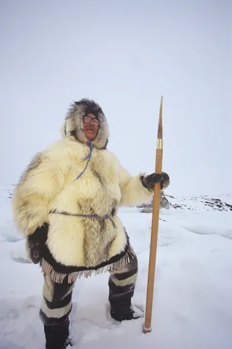 Inuit Elder, Simeonie Aqpik in traditional clothing, Kimmirut, Baffin Island, Nunavut, Canada.