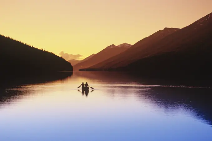 Canoeist on Isaac lake, Bowron Lake Provincial Park, British Columbia, Canada.