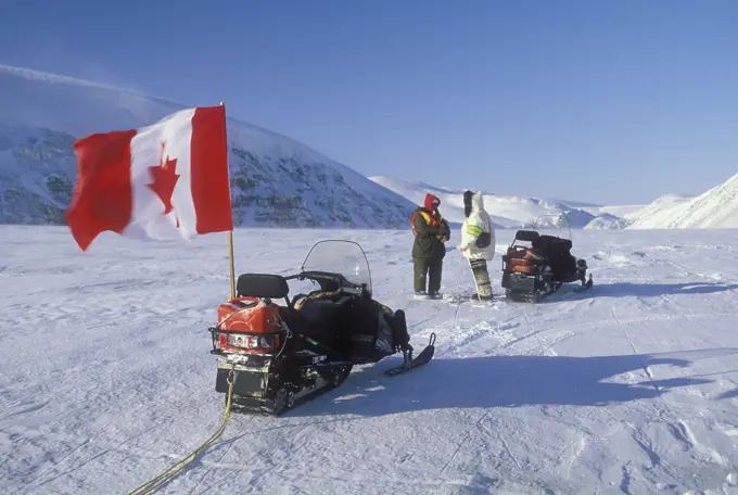 Snowmobiling near Sovereignty, Nunavut, Canada.