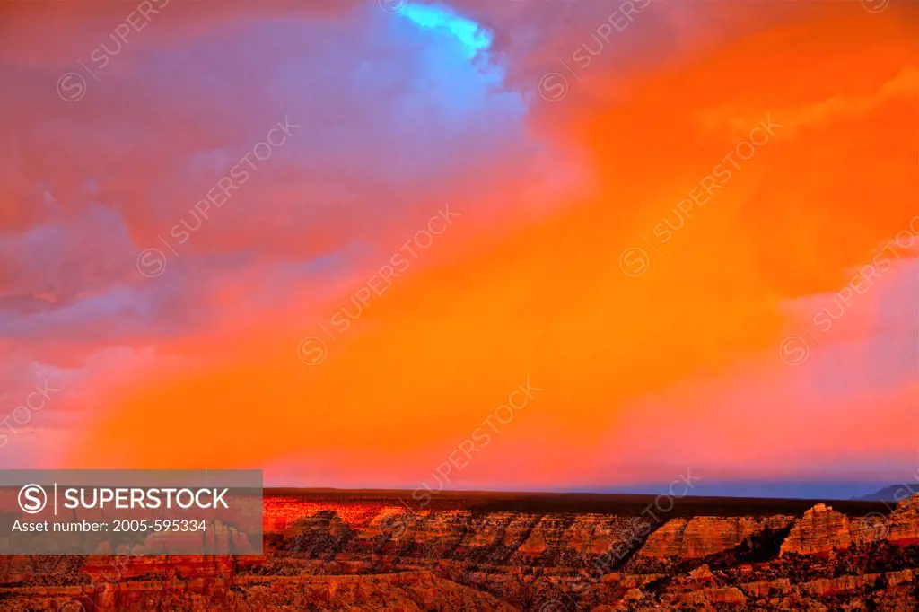 Alpenglow on rain over a canyon, Grand Canyon, Grandview Point, Grand Canyon National Park, Arizona, USA