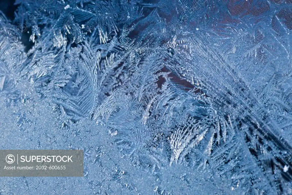 Frost patterns on automobile windshield