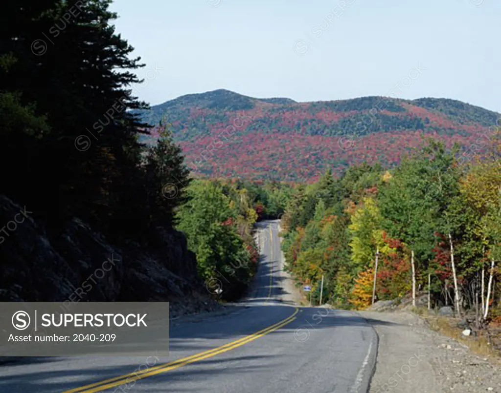 Road leading towards a mountain, Coburn Gore, Maine, USA