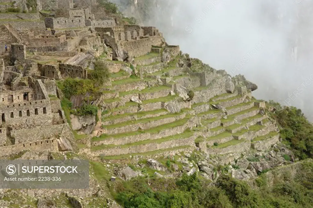 Inca ruins at an archaeological site, Machu Picchu, Urubamba River, Cusco Region, Peru