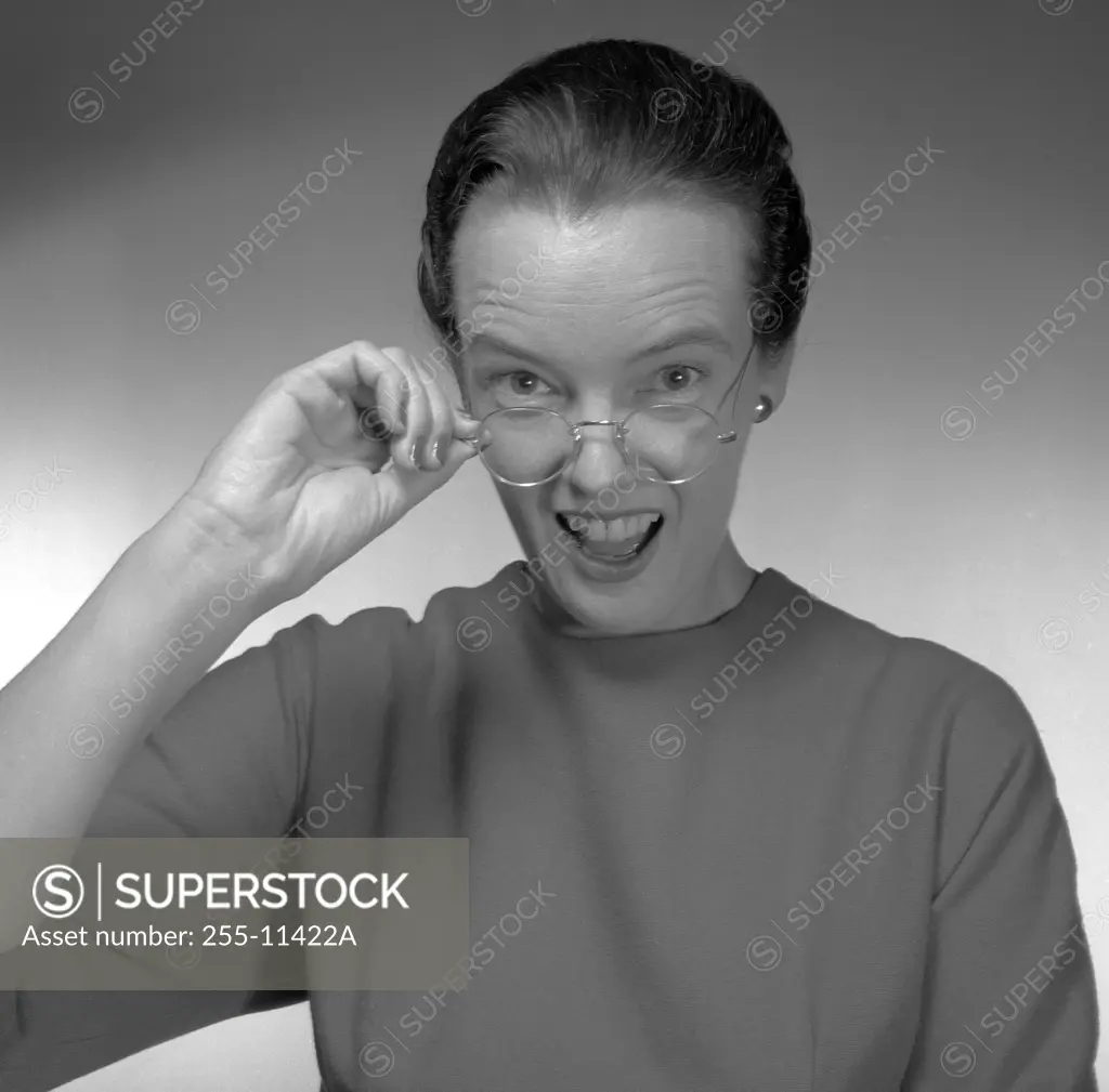 Portrait of mid adult woman with glasses