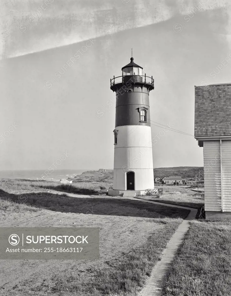 Vintage photograph. Nauset Light house, Ocean in distance 