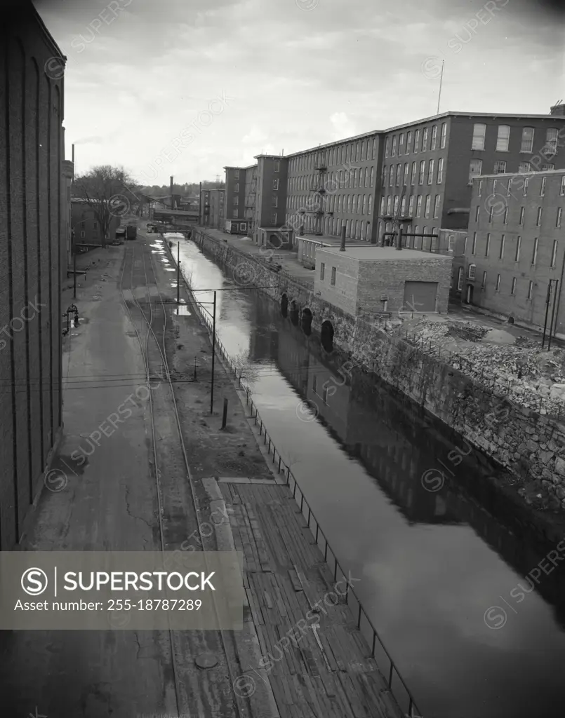 Vintage photograph. Industrial Mills at Manchester, New Hampshire. New England canal