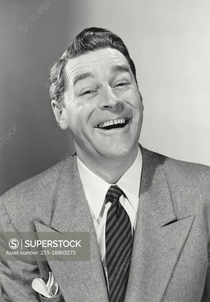 Vintage photograph. Portrait of businessman smiling