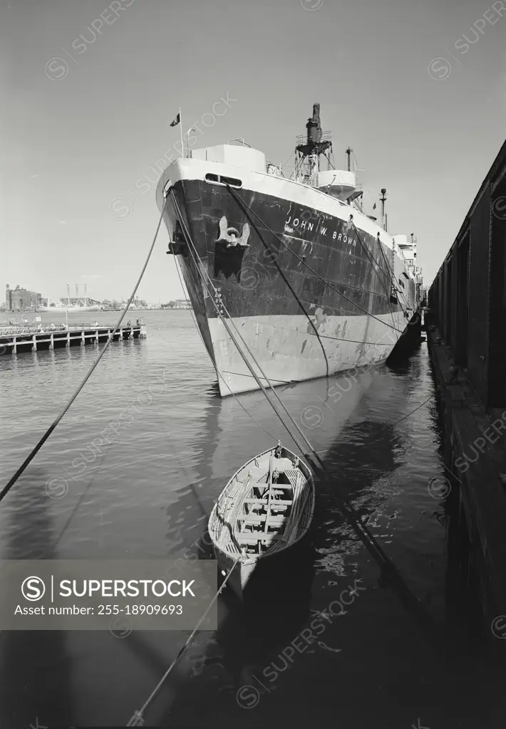 Vintage photograph. John W Brown freight docked at east river pier (manhattan industrial high school students train on this ship)