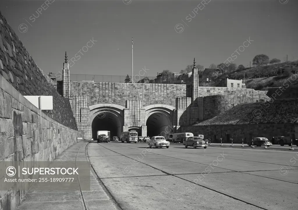 Vintage photograph. the lincoln tunnel plaza on the new jersey side with cars and trucks on road