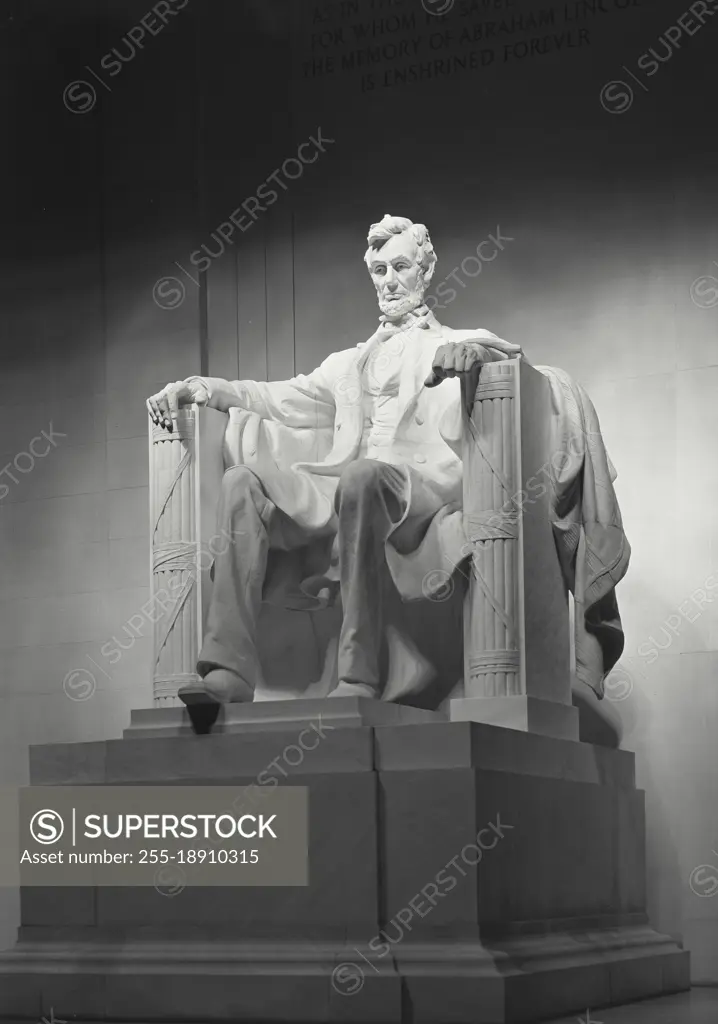 Vintage photograph. Quarter angle front view of Daniel Chester French's statue of Abraham Lincoln in the Lincoln Memorial