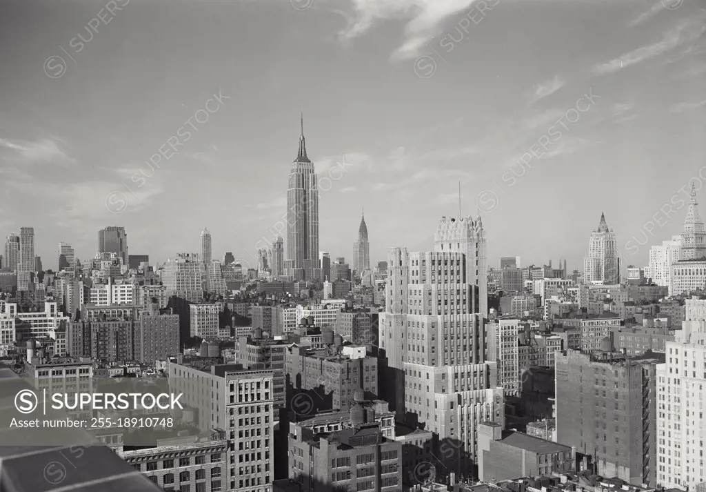 Vintage photograph. Mid Town skyline of Manhattan with Empire State Building, New York City