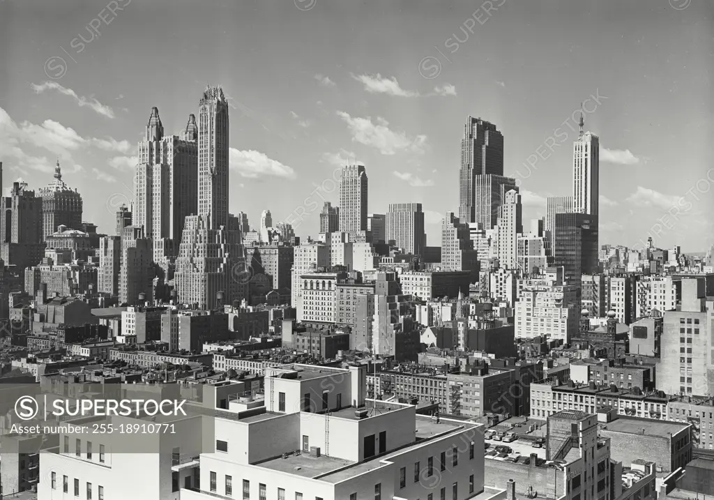 Vintage photograph. Looking south towards Mid Town Manhattan skyline from vicinity of East 57th Street