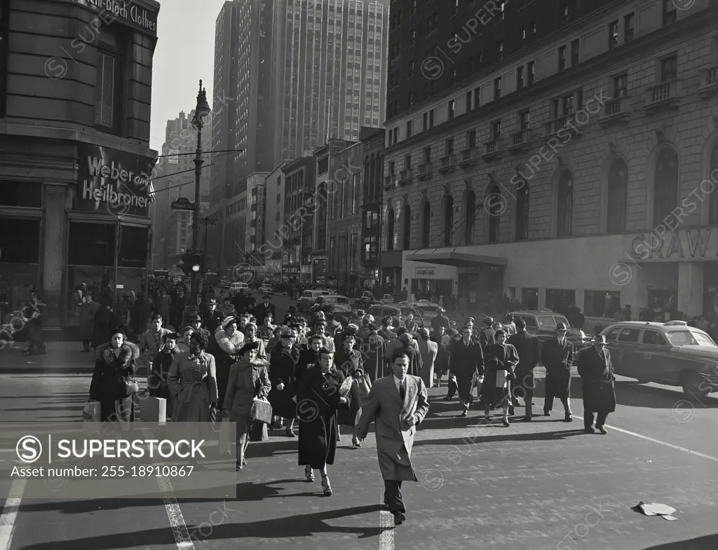 Vintage photograph. Pedestrians crossing the street near 34th Street, New York City