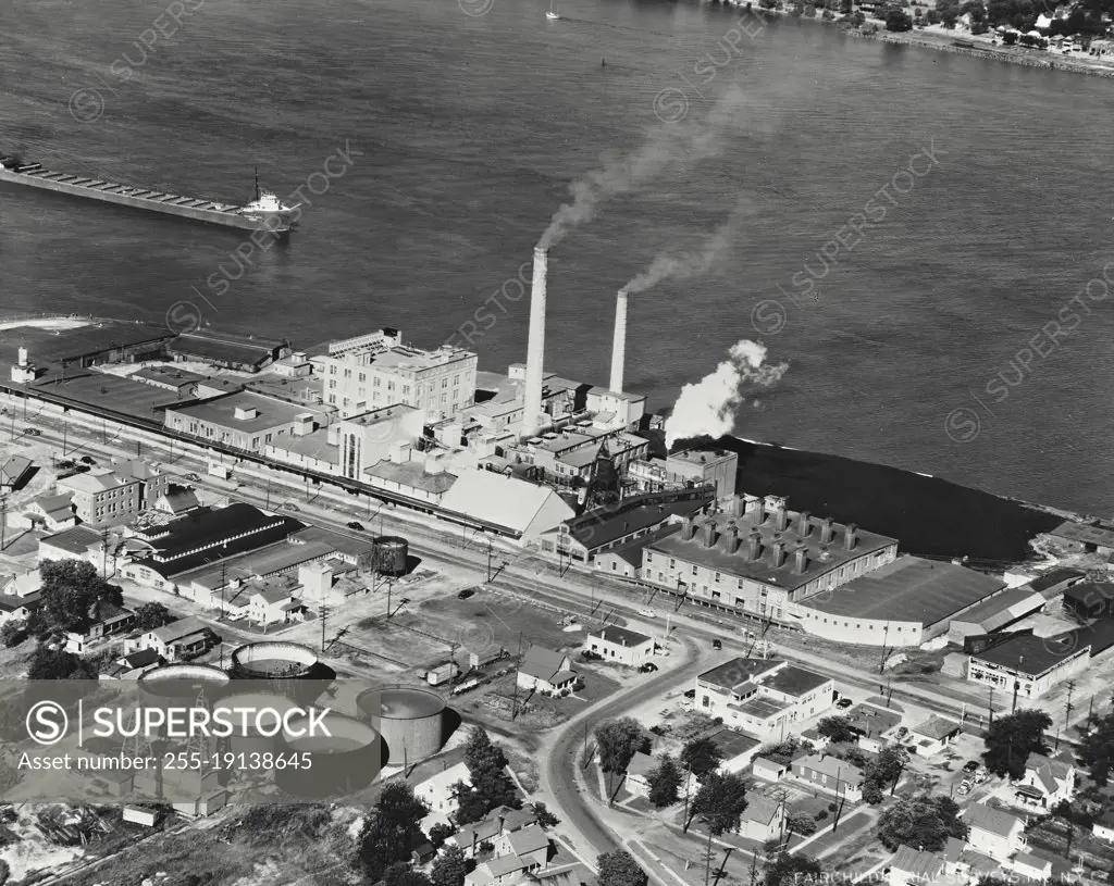 Vintage photograph. Aerial view of the Diamond Crystal-Colonial Salt Division plant of General Foods on the St Clair River with salt wells in left foreground