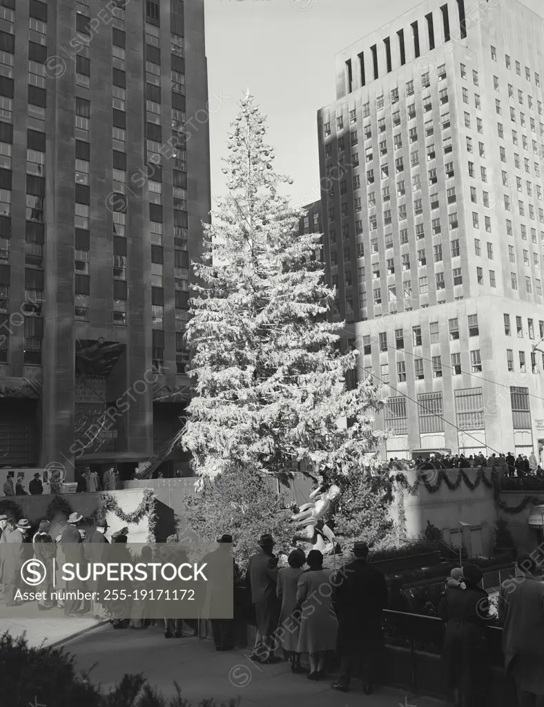 Vintage photograph. Christmas tree scene in plaza. Rockefeller Center