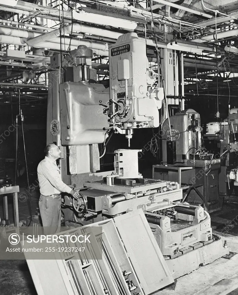 Vintage photograph. $30,000 precision drill with hydraulically moveable table in operation at Convair's San Diego Division