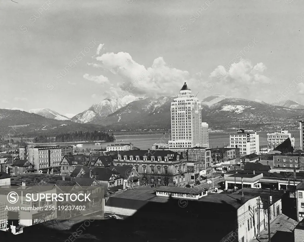 Vintage photograph. Downtown Vancouver showing marine building