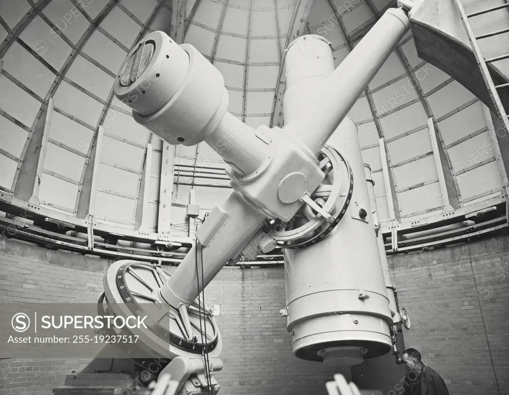 Vintage photograph. The Curtis Memorial Telescope of the Portage Lake Observatory of the University of Michigan, with a 24"-36" Schmidt type camera