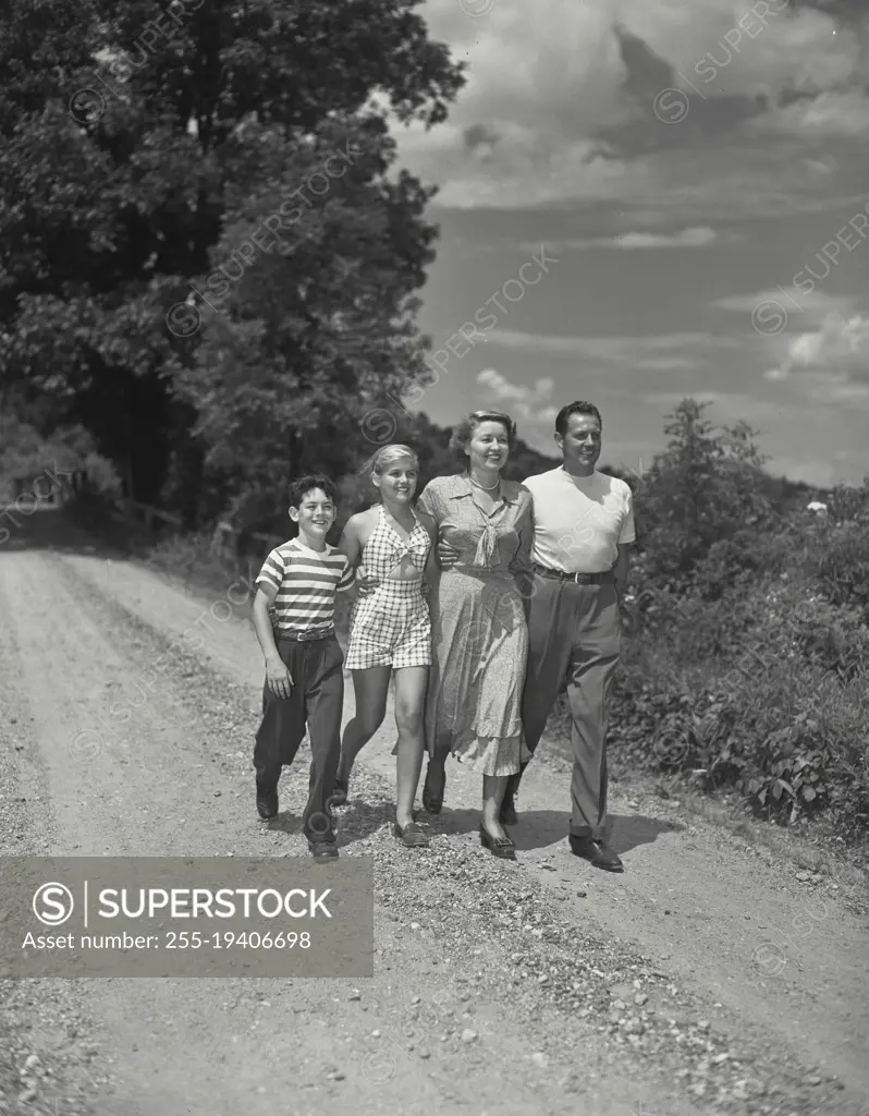 Vintage photograph. Family on country road