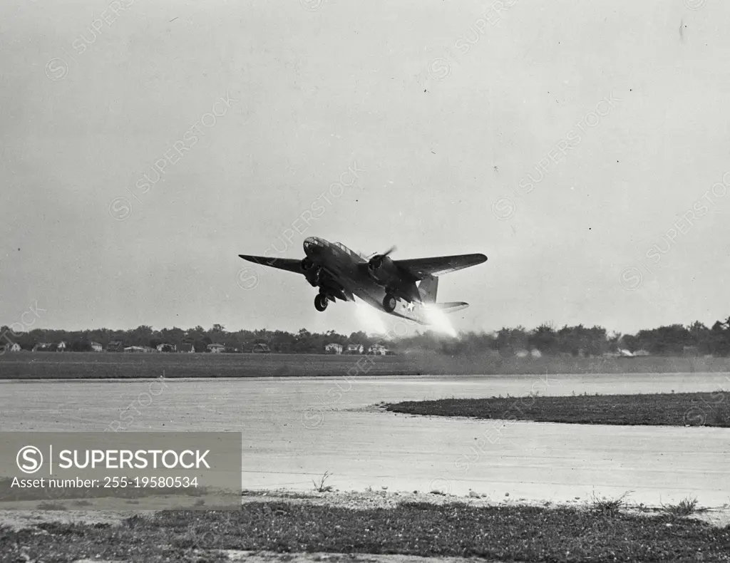 Vintage photograph. A-20, equipped with rockets to shorten takeoff run at Wright field