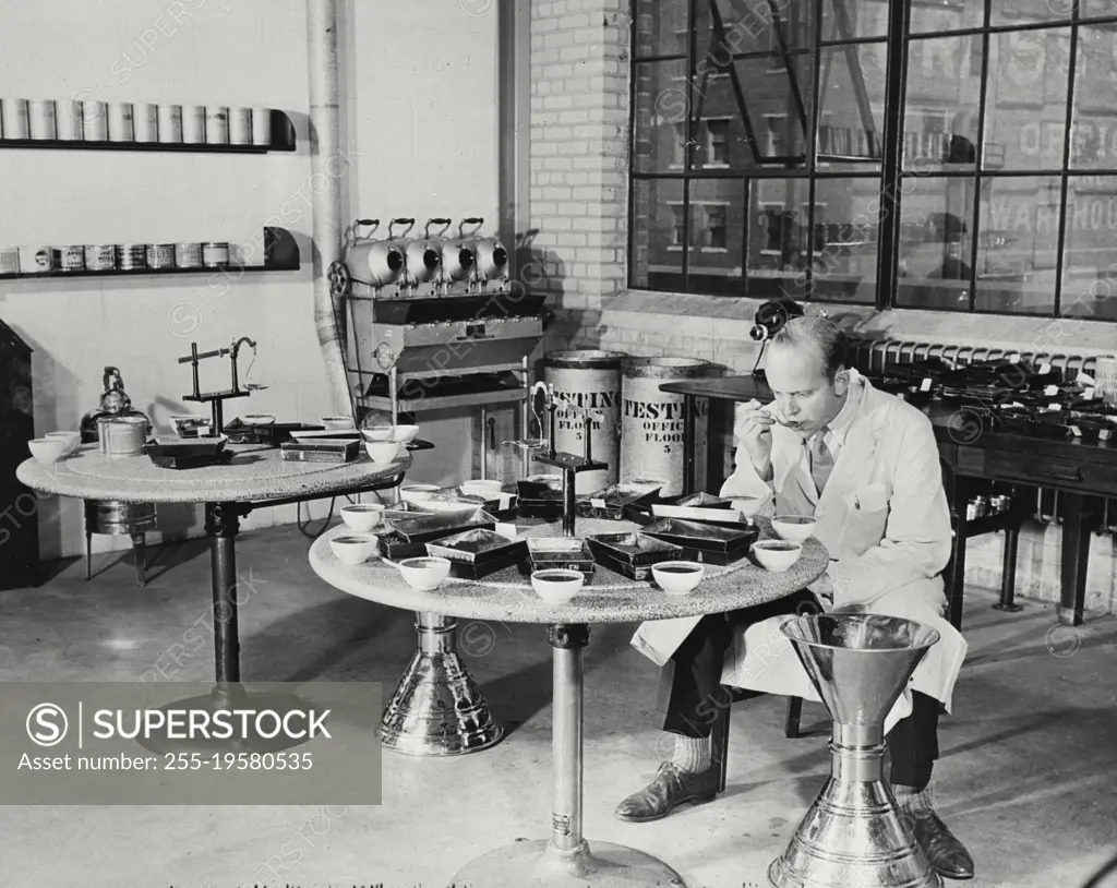 Vintage photograph. The taste test at Maxwell House coffee plant