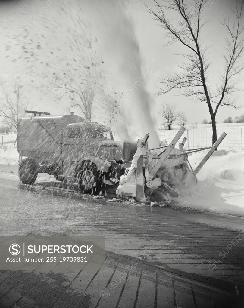 Vintage photograph. Snow plow in winter