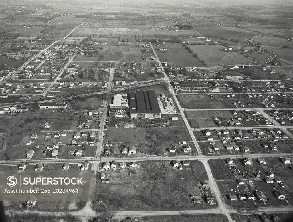 Aerial view of Richmond, Indiana on the outskirts of town, the south side. Features the National Automatic Tool Company, which makes multiple spindle machine tools, and in the distance is the Chesapeake and Ohio Railroad