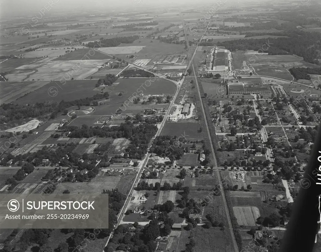 Aerial view of Richmond, Indiana with State Route 38 on the left, Farmers Co-op in center, Chesapeake and Ohio Railroad on right, along with factories of Crosley refrigerators