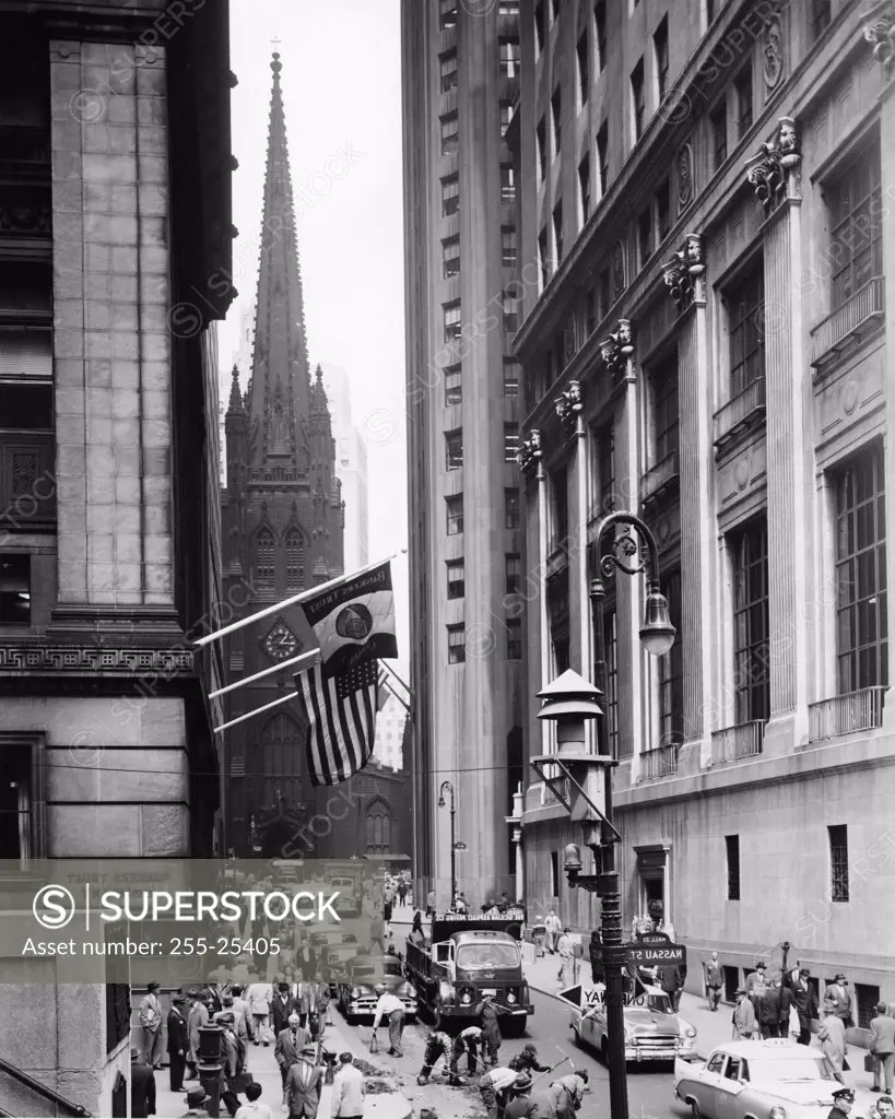 Traffic on a road in front of a church, Trinity Church, Wall Street, Manhattan, New York City, New York, USA