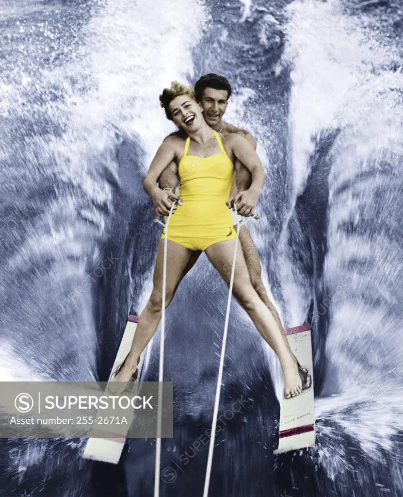 Portrait of a young couple waterskiing