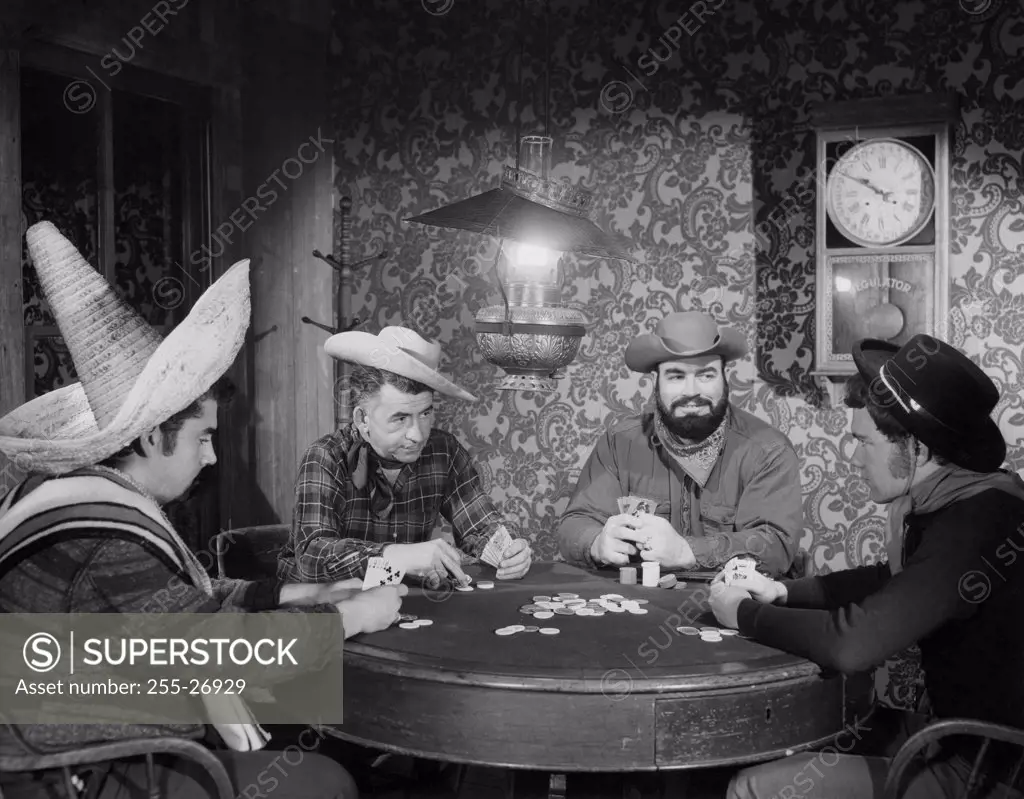 Cowboys playing poker in a casino