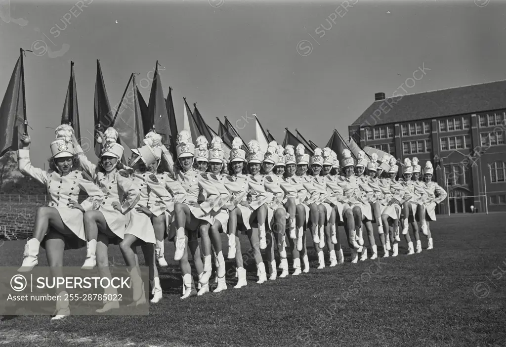 Vintage Photograph. Teenage girls doing acrobatic twirling.