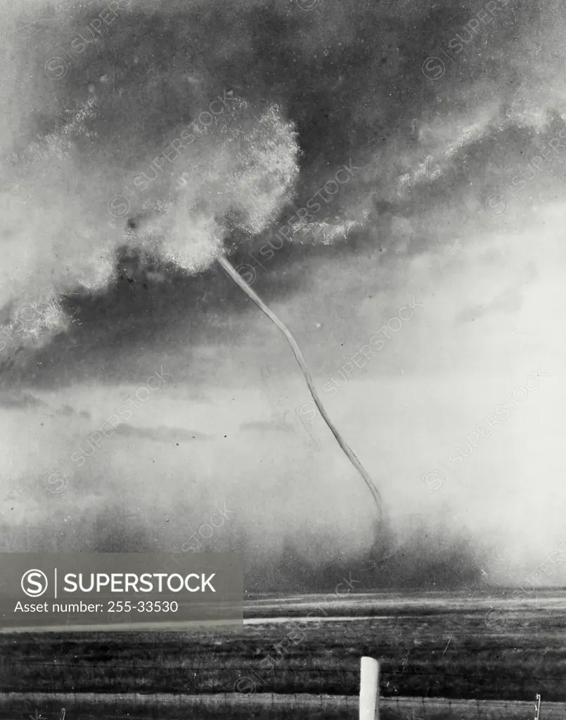 Vintage photograph. Tornado in a field