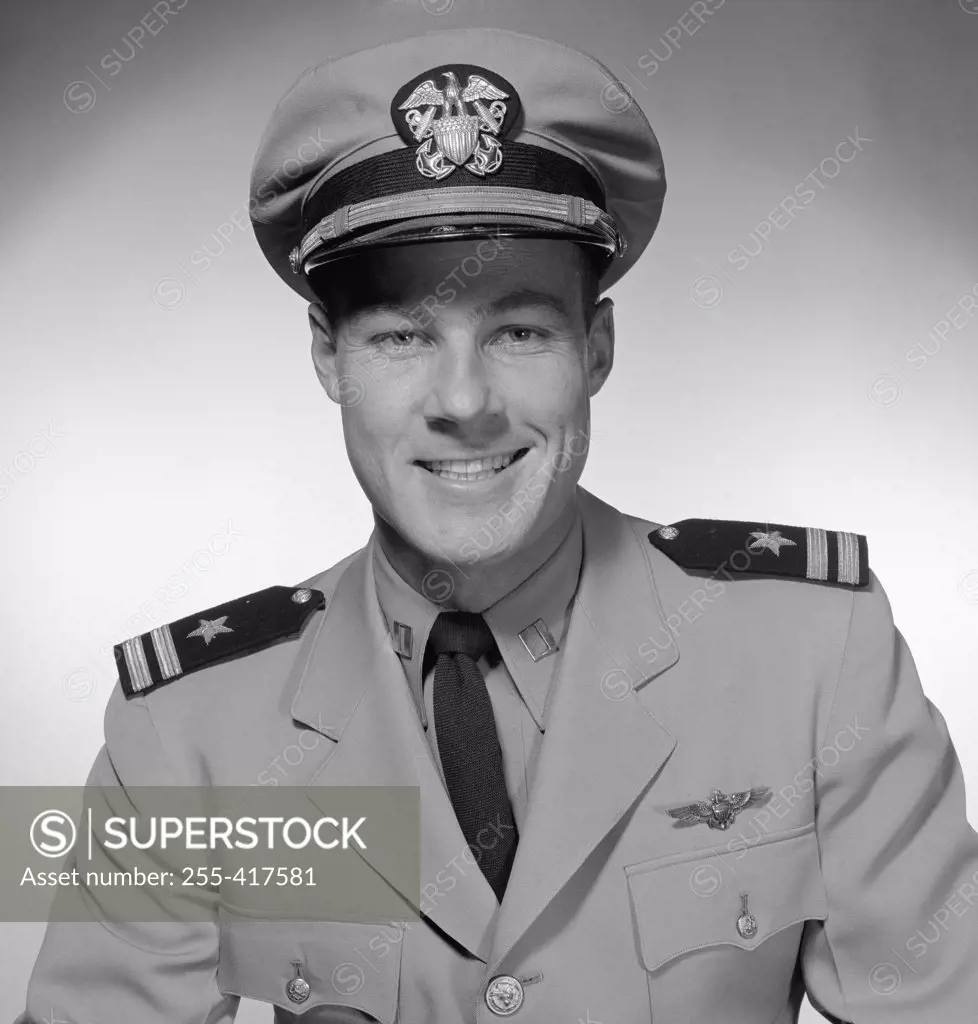 Studio portrait of male pilot smiling