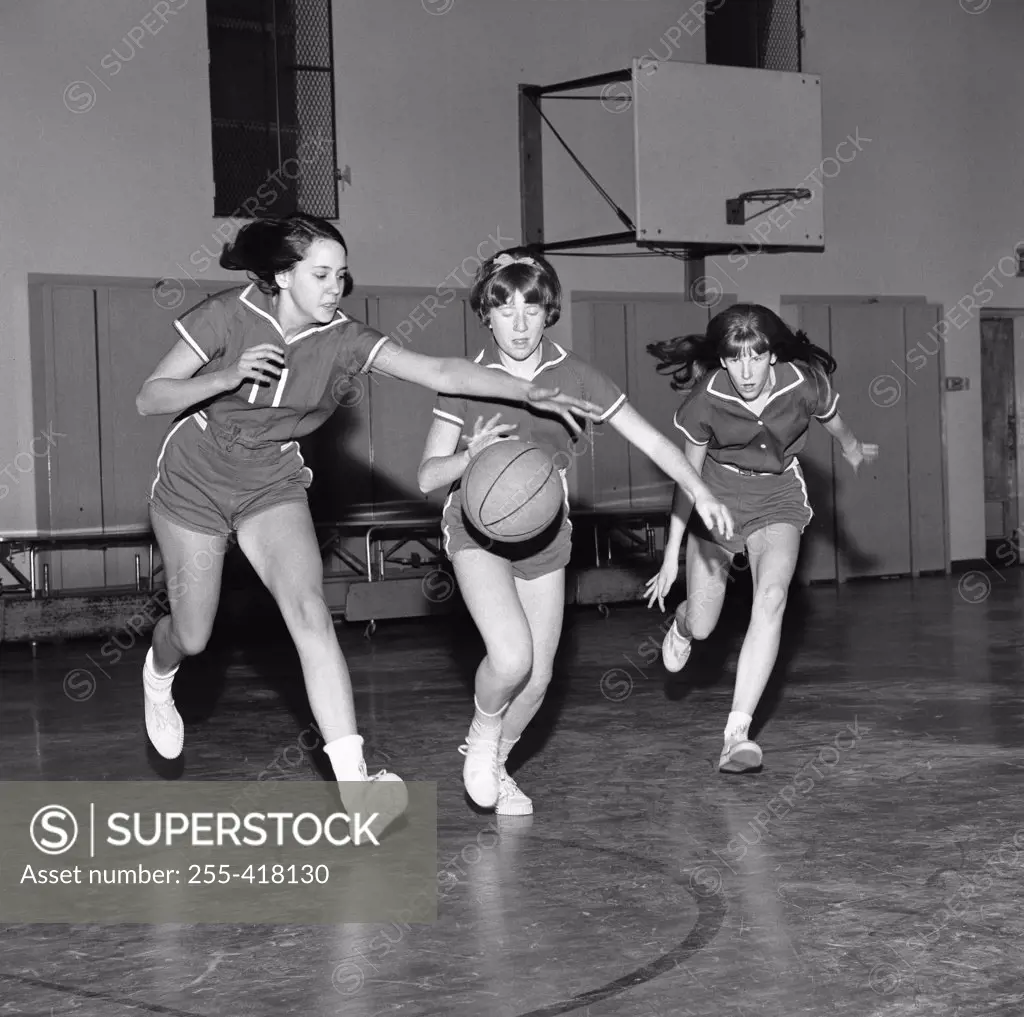 Girls playing basketball