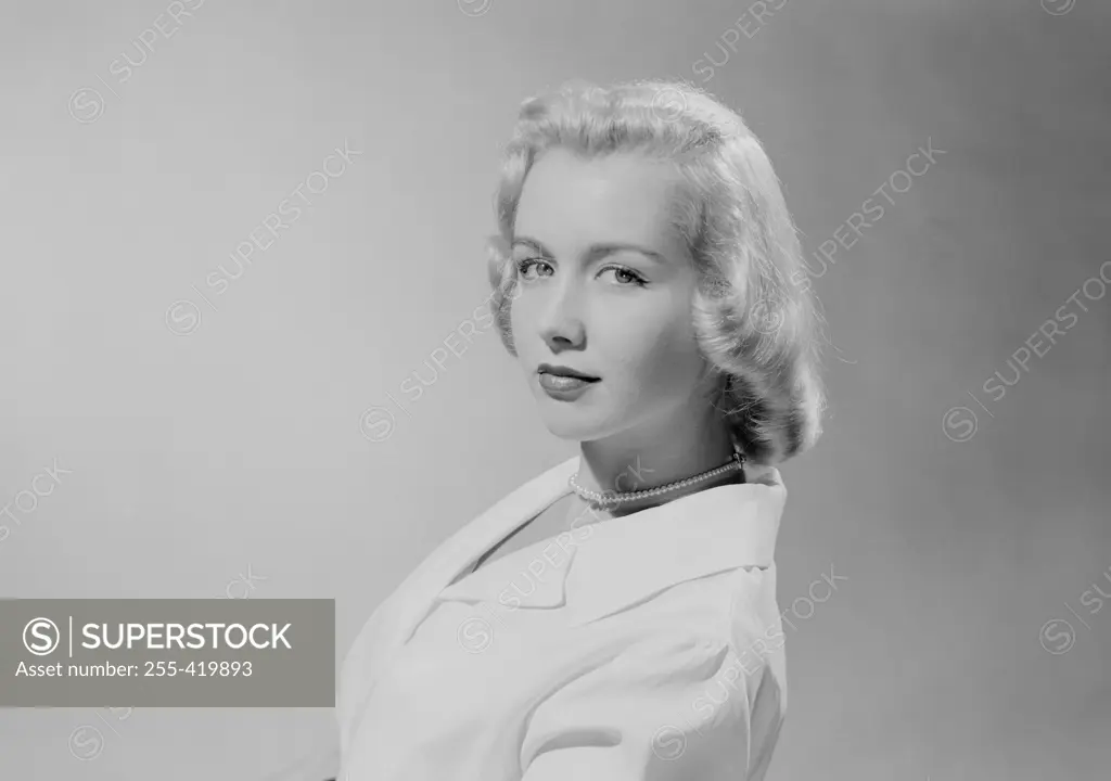 Portrait of Beautiful blonde woman, studio shot