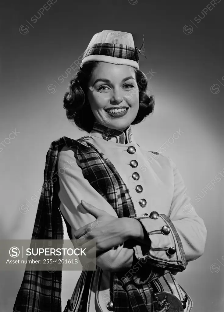 Portrait of young woman wearing uniform