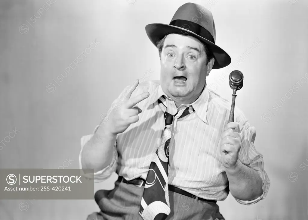 Studio portrait of auctioneer