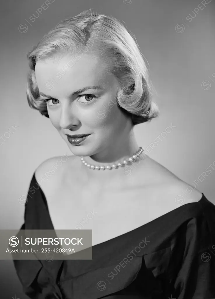 Studio portrait of young woman