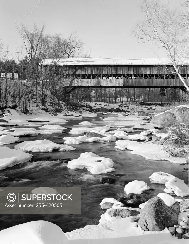 USA, New Hampshire, Jefferson, Winter Landscape with wooden covered bridge