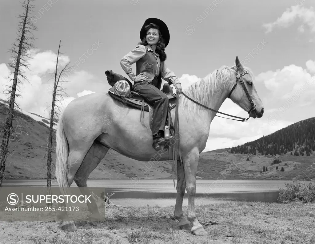 Portrait of cowgirl on horse