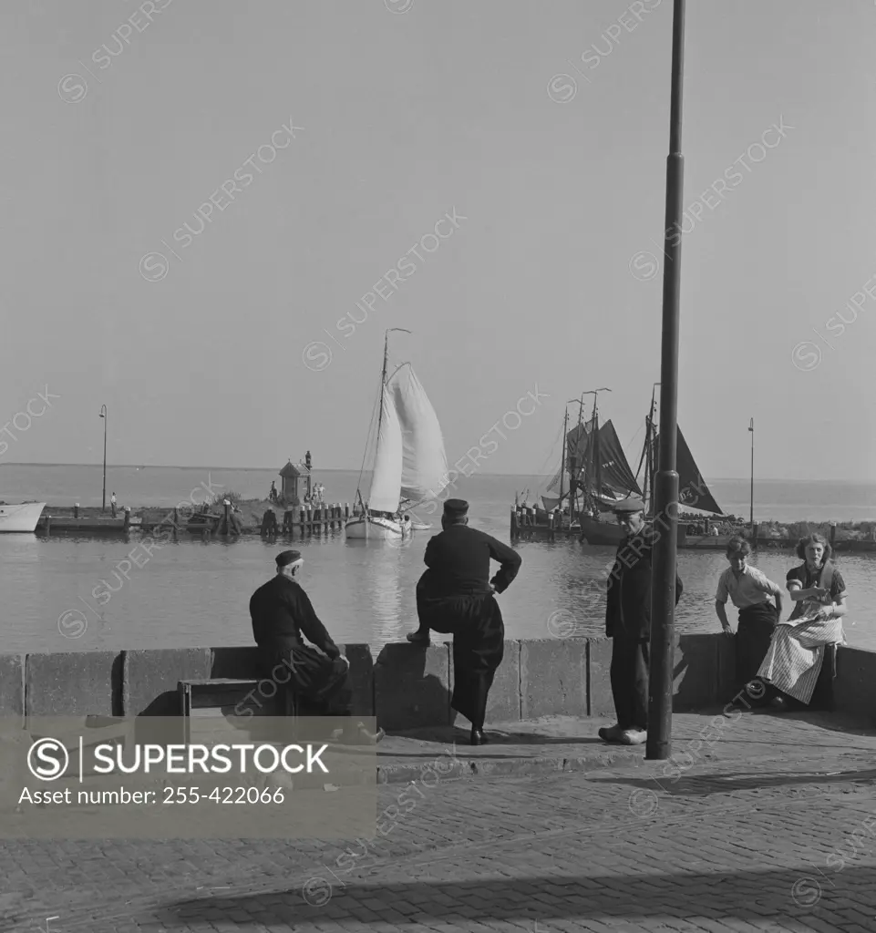 Holland, Volendam, arriving fishing fleet